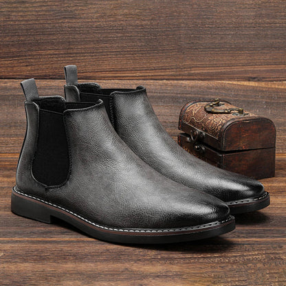 Frontal shot of classic men's slip-on Chelsea boots, ideal for everyday wear and versatile styling.