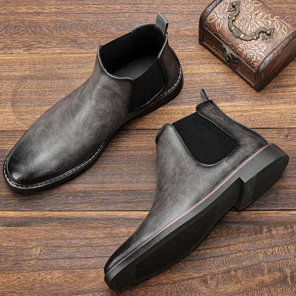 Durable sole of a men's versatile Chelsea boot, designed for comfort and traction.