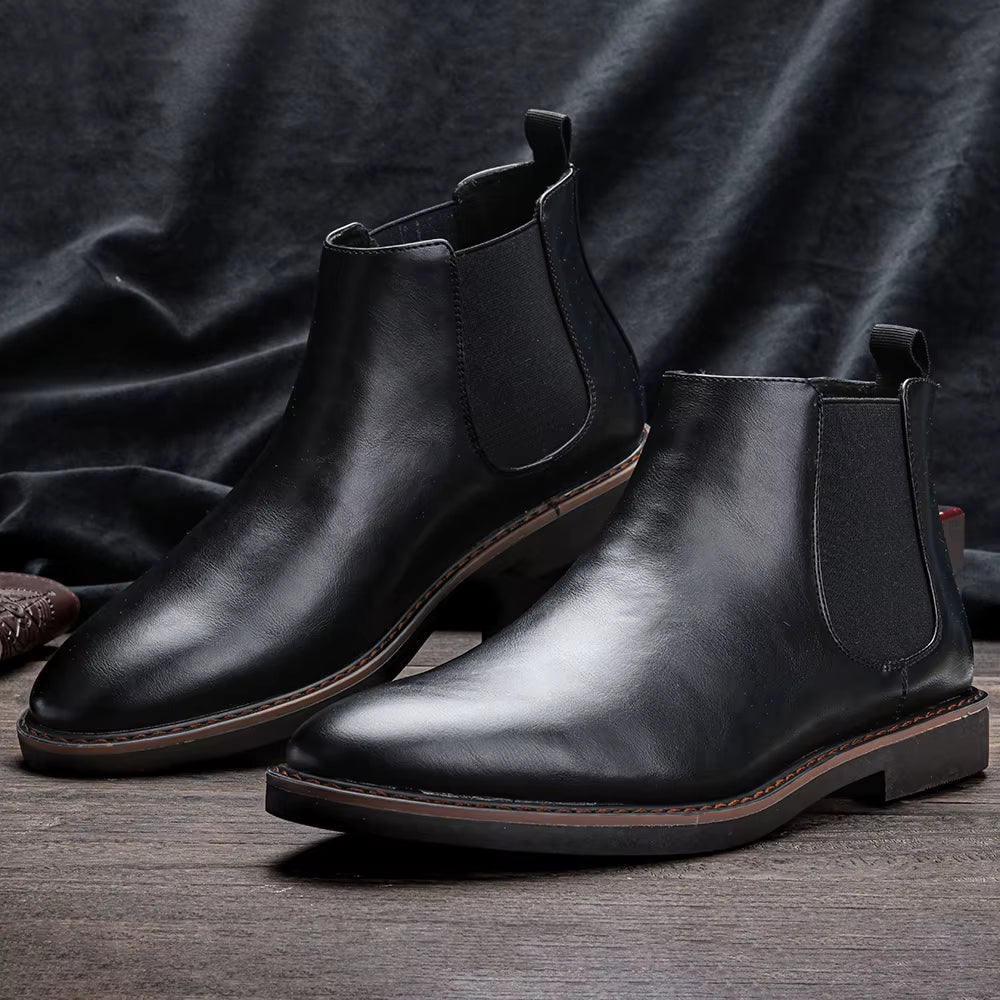 Classic men's fashion Chelsea boots in a studio setting, emphasizing their sophisticated style.
