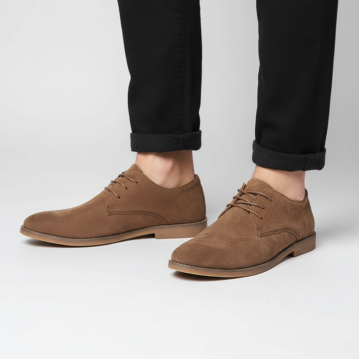 Comfortable black Oxford lace-up dress shoes for men, perfect for work, casual wear, and timeless fashion.