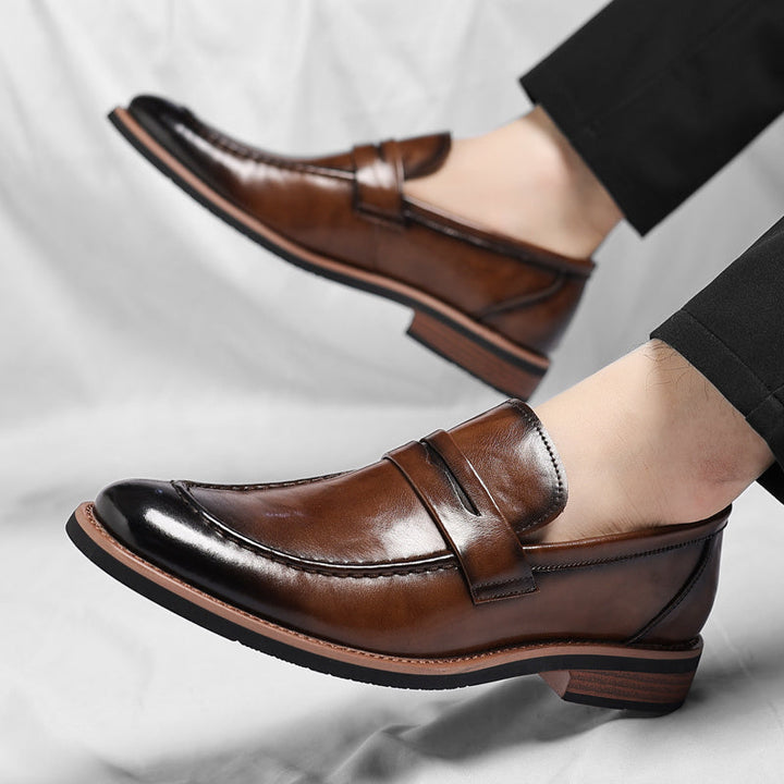 Men wearing classic leather penny loafers, comfortable slip-on dress shoes perfect for professional & casual looks.