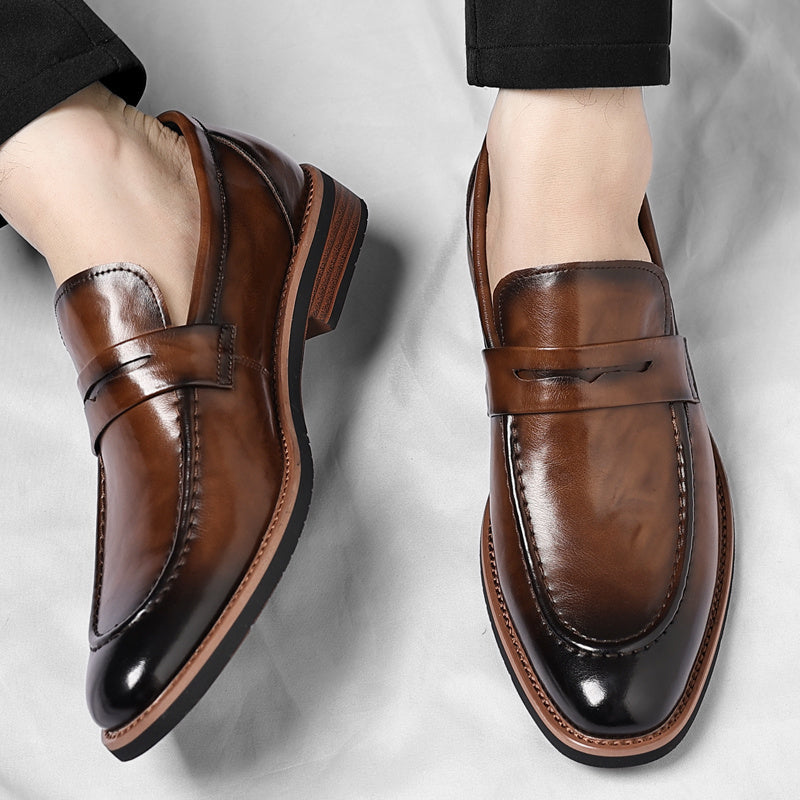 Elegant men's navy blue penny loafers, classic comfortable slip-on shoes for versatile dress & casual wear.