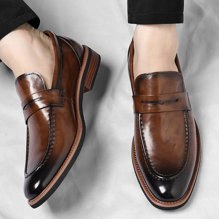 Elegant men's navy blue penny loafers, classic comfortable slip-on shoes for versatile dress & casual wear.