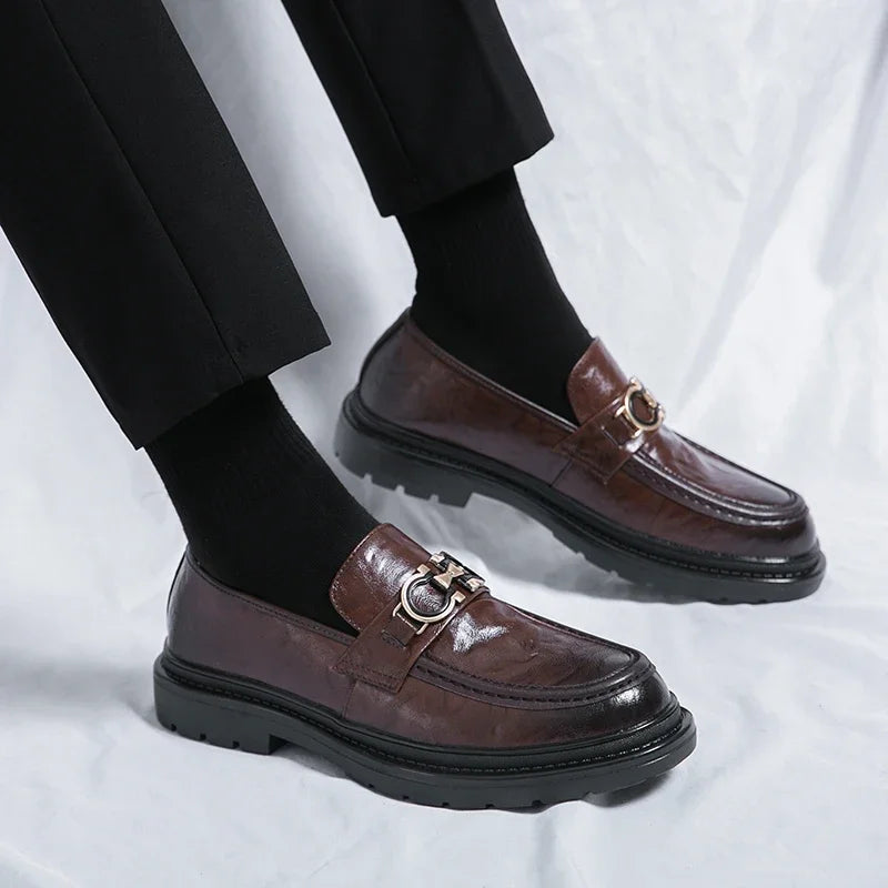 Men's stylish brown leather loafers, easy slip-on comfort for versatile fashion.