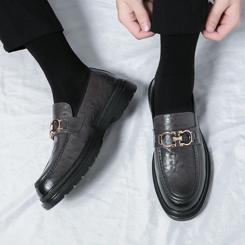 Men's classic slip-on loafers in rich brown, embodying style and comfort.