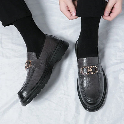 Men's classic slip-on loafers in rich brown, embodying style and comfort.