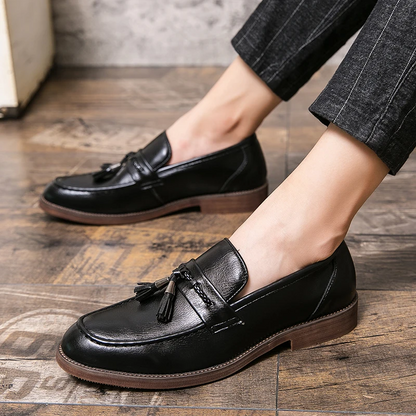 Comfortable brown men's fashion loafers, classic tassel style for everyday elegance.