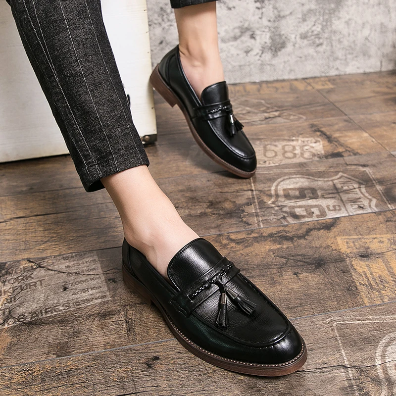 Men's formal brown tassel loafers, combining traditional style with modern comfort.