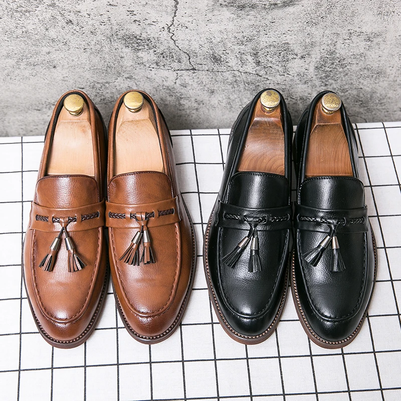 Men's polished brown formal tassel loafers, offering classic style and supreme comfort.