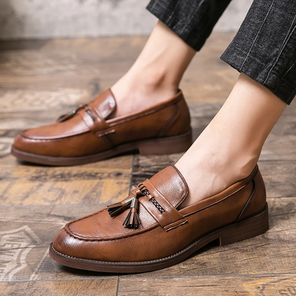 Classic black men's dress shoes, premium leather tassel loafers for refined style.