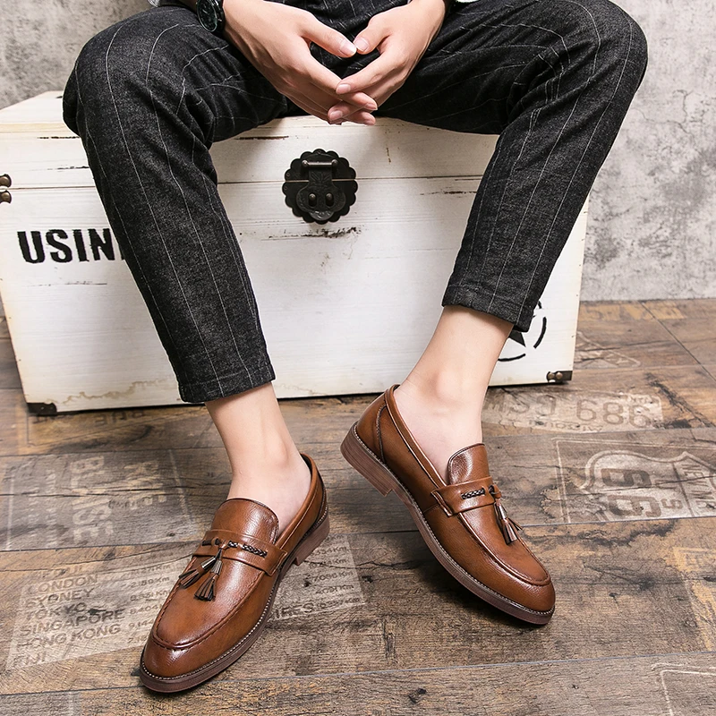Classic brown men's footwear: slip-on tassel loafers for a smart casual or dressy look.