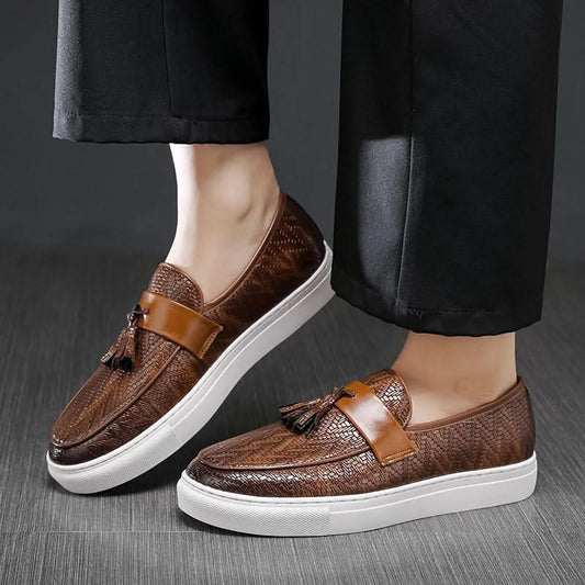 Men's classic brown leather tassel loafers. Stylish slip-on dress shoes for versatile fashion & office wear.