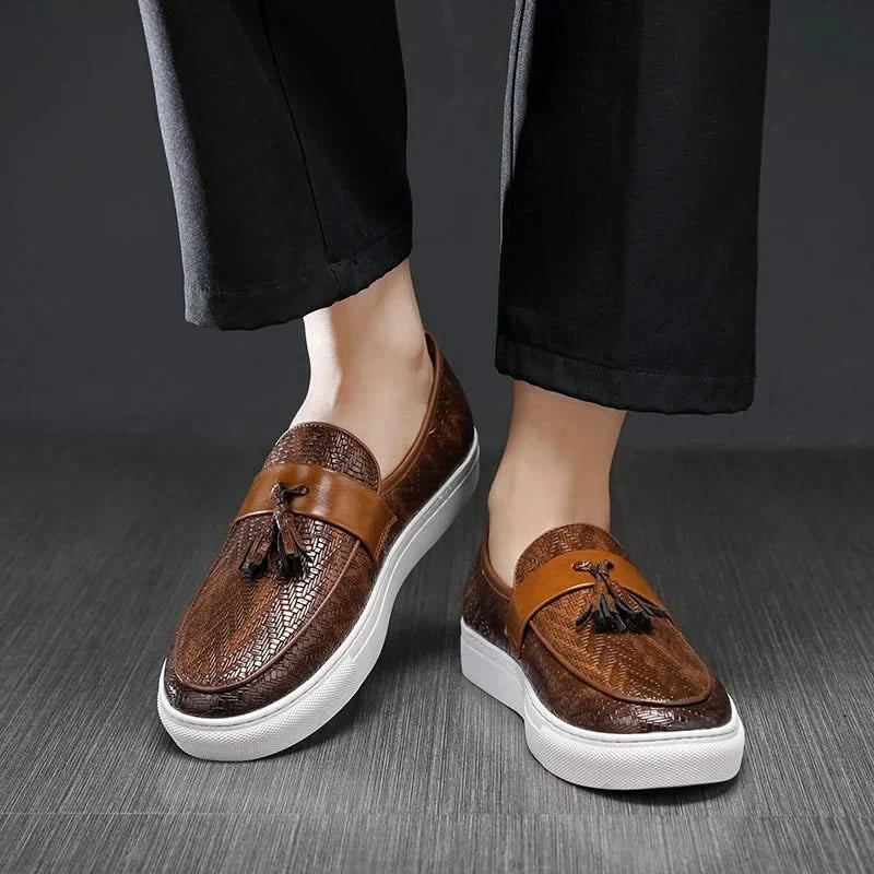 Comfortable men's black tassel loafers. Slip-on casual footwear, perfect for everyday style & versatility.