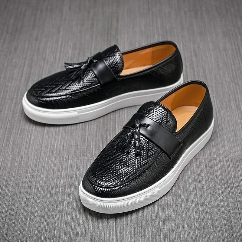 Men's stylish brown tassel loafers. Comfortable slip-on footwear, ideal for dress, casual, or office fashion.