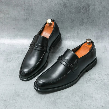 Classic men's black slip-on dress shoes, offering sophisticated style and comfort for daily wear.
