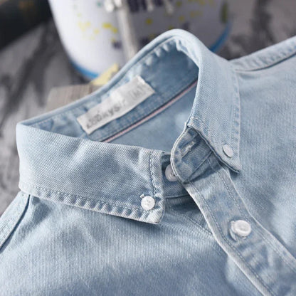 Stylish men's casual button-down long sleeve shirt, perfect for versatile everyday wear and classic fit.
