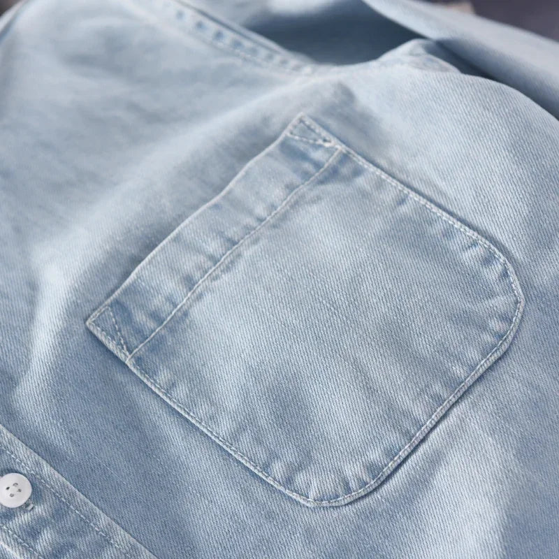 Men's apparel: Classic fit button-down long sleeve shirt in denim style for comfortable everyday wear.