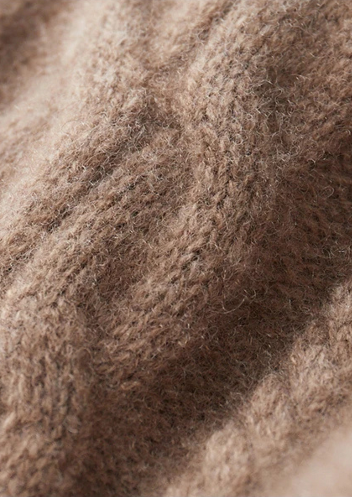 Versatile men's cable knit crew neck sweater for stylish layering in winter. Cozy knitwear.