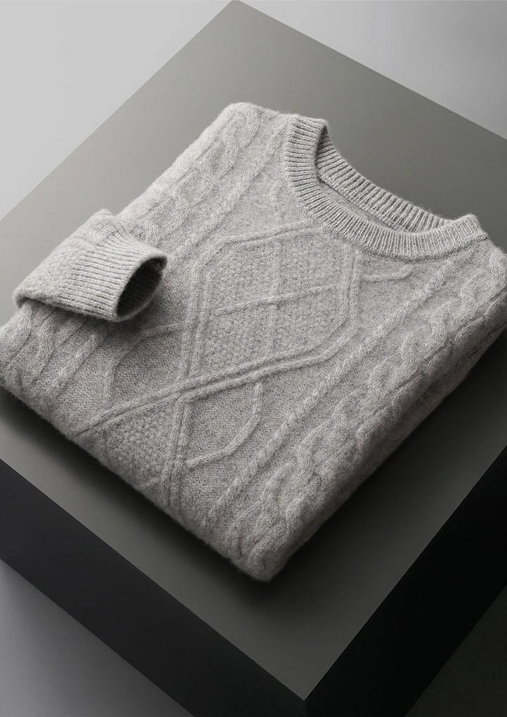 Elegant yet casual men's cable knit crew neck sweater, perfect for cold weather style.