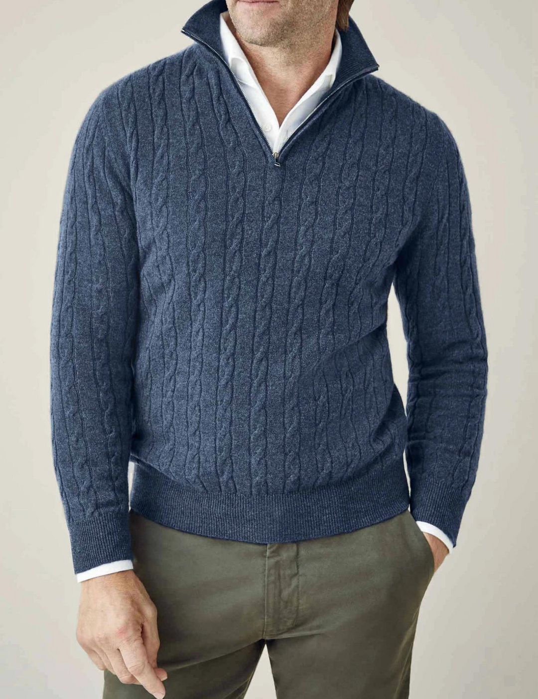 Men's classic cable-knit quarter-zip sweater in a cozy winter knit, perfect for everyday wear.