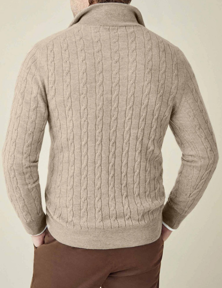 Effortlessly stylish men's cable-knit quarter-zip sweater, blending comfort and classic design.