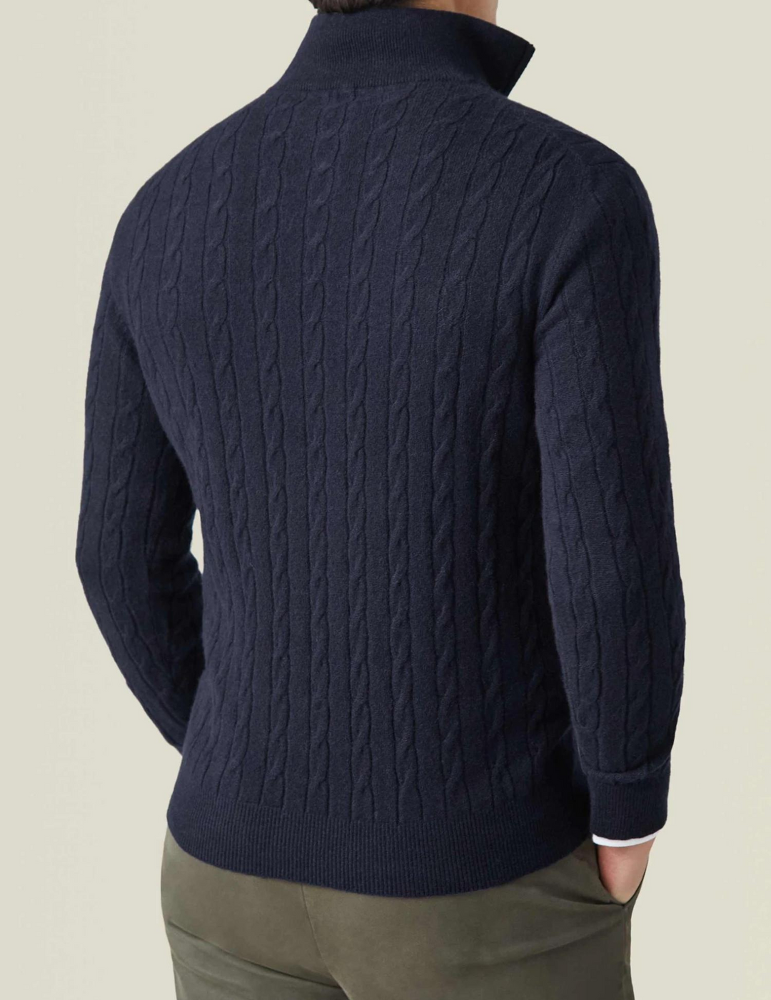 Modern men's fashion cable knit quarter-zip sweater, a classic winter wardrobe staple knitwear.