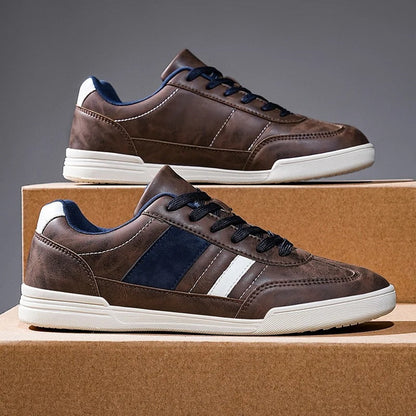 Comfortable gray men's casual shoes, perfect for everyday wear. Stylish low-profile athletic casual sneakers.