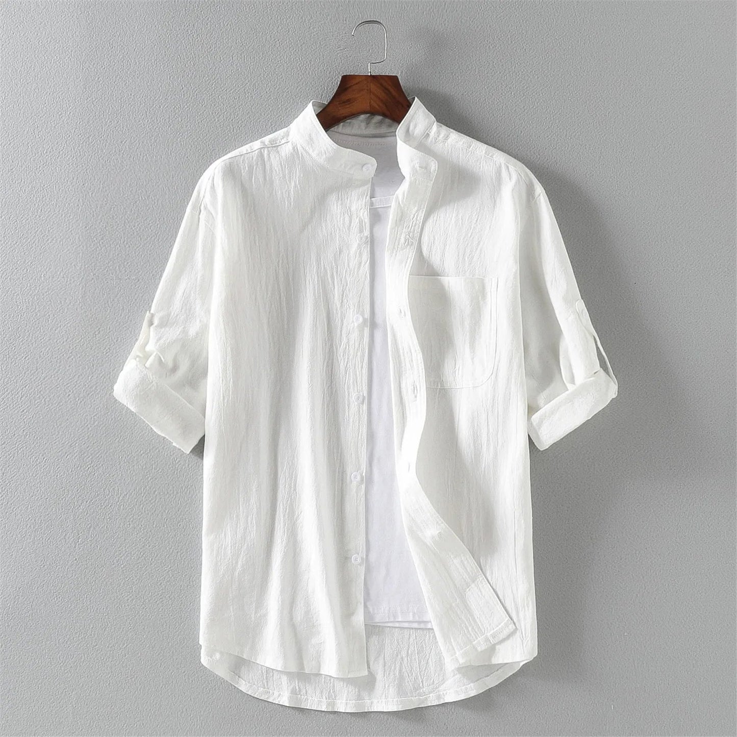 Back view of a men's classic long sleeve cotton button-up shirt, highlighting its relaxed fit for comfort.