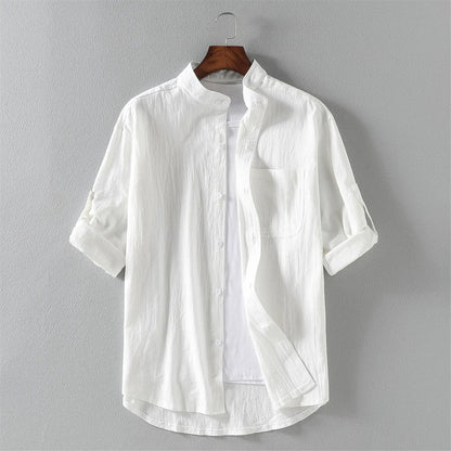 Back view of a men's classic long sleeve cotton button-up shirt, highlighting its relaxed fit for comfort.