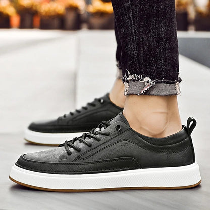 Stylish men's dark brown leather casual footwear, classic sneakers for urban comfort.