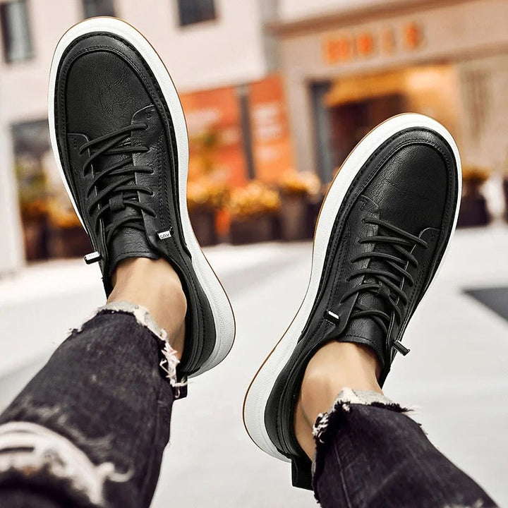 Classic dark brown men's sneakers, comfortable leather footwear for urban everyday style.