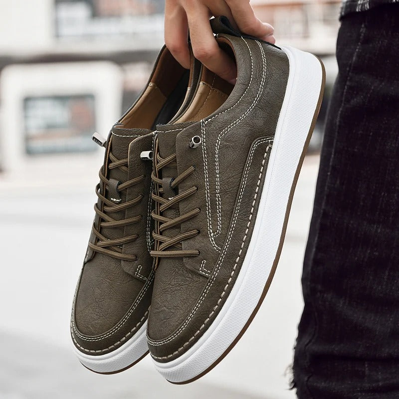 Classic men's leather sneakers in dark brown, perfect for urban style and walking.