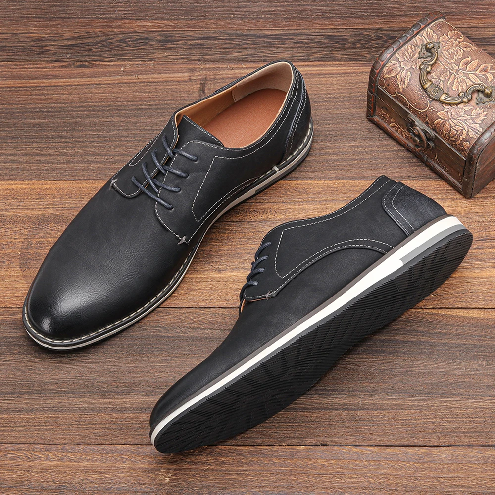 Side view of classic black leather men's derby dress shoes, featuring elegant design for business attire.