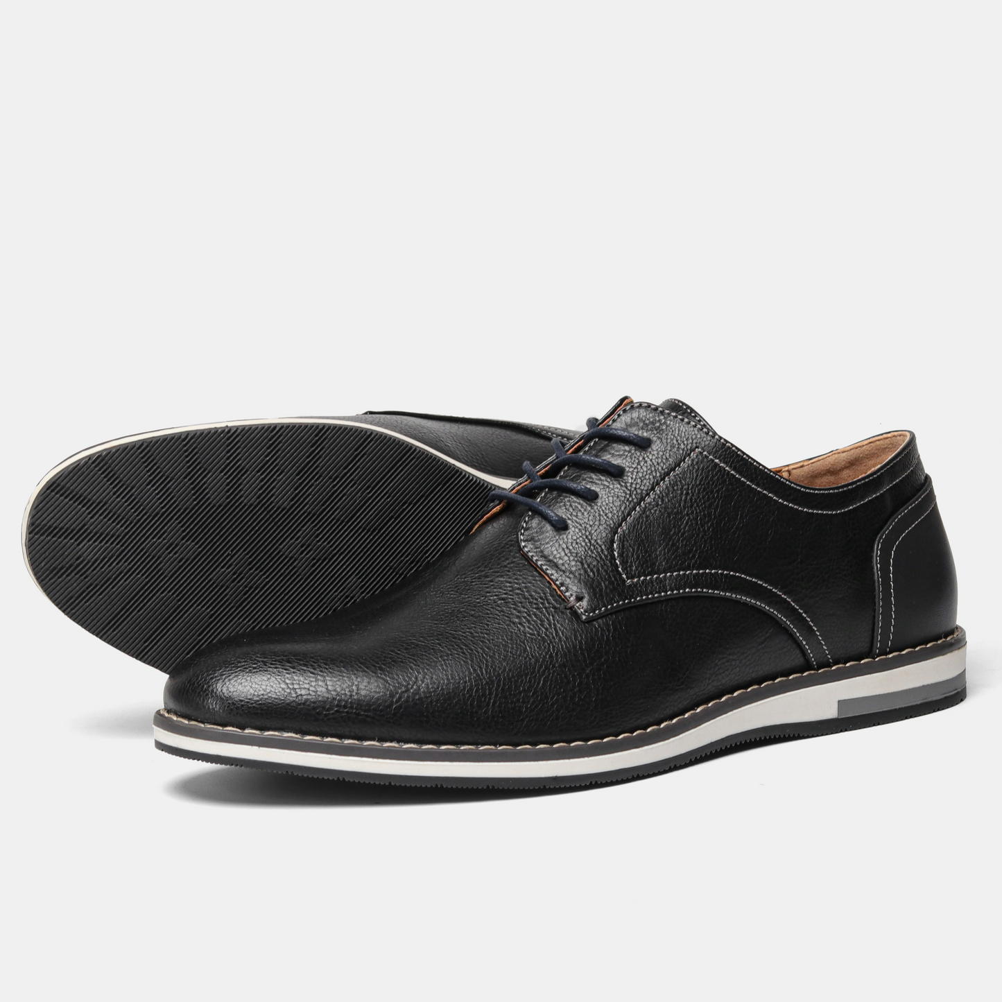 Men's classic black leather derby dress shoes, styled for a sharp, professional and elegant men's fashion look.