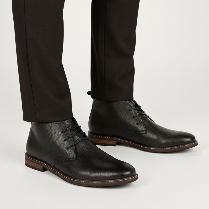 Rugged men's desert boots, built for durability and all-season wear, combining classic style with comfort.