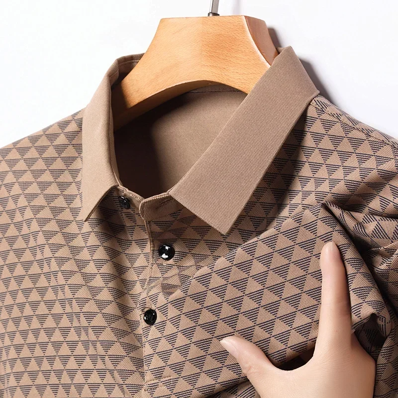 Men's short sleeve polo featuring a subtle diamond pattern, offering refined style for casual & everyday wear.