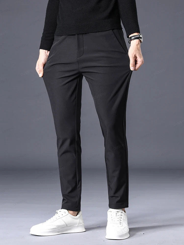 Versatile men's classic fit blue dress pants, tailored for comfort, ideal for business casual or everyday style.