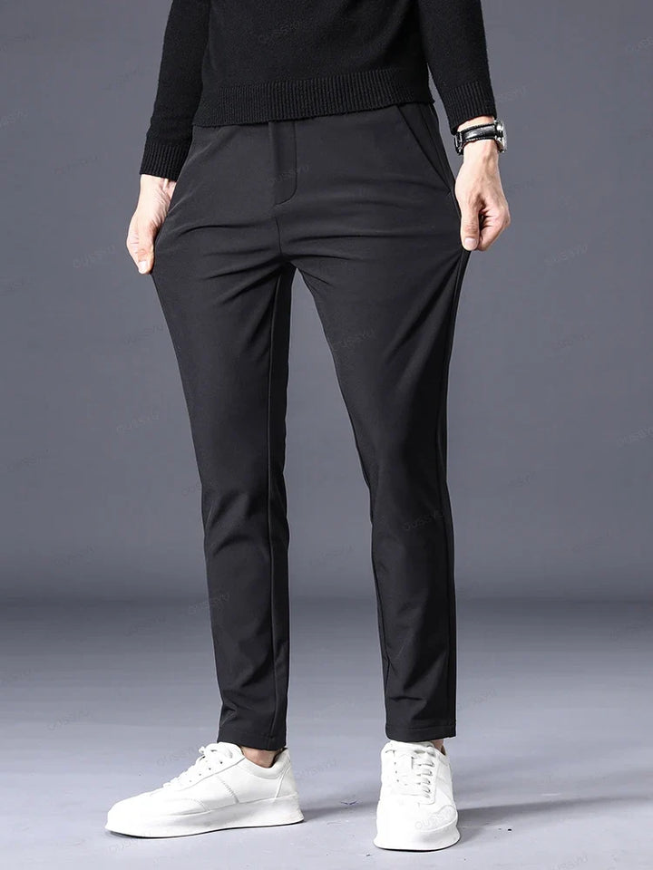 Versatile men's classic fit blue dress pants, tailored for comfort, ideal for business casual or everyday style.