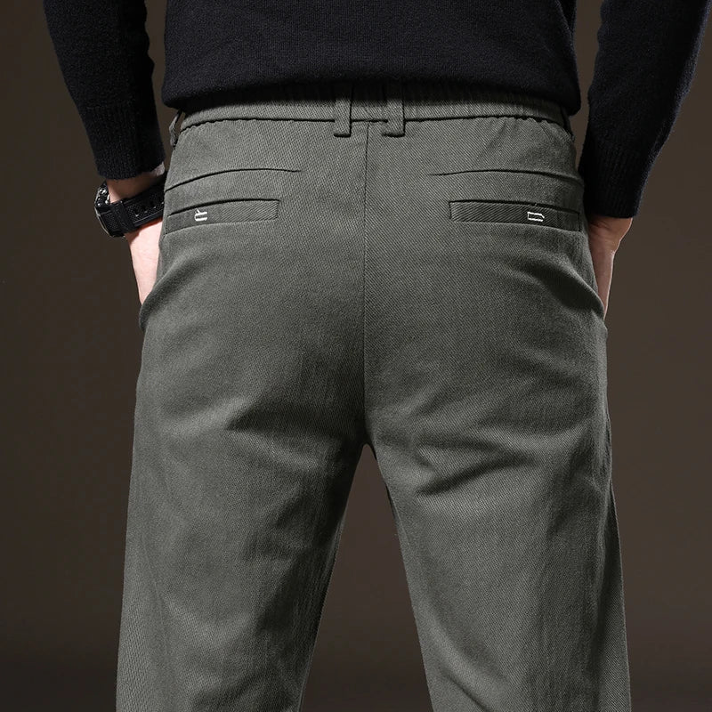 Black classic fit men's stretch trousers, tailored for style and wrinkle resistance.