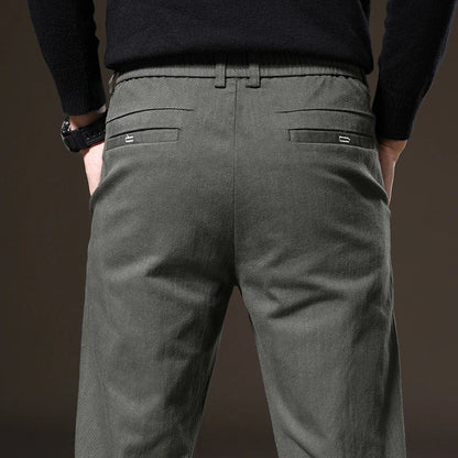 Black classic fit men's stretch trousers, tailored for style and wrinkle resistance.