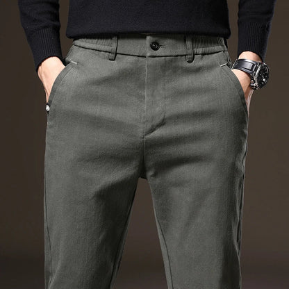 Wrinkle-resistant classic fit men's pants, offering tailored style and lasting durability.