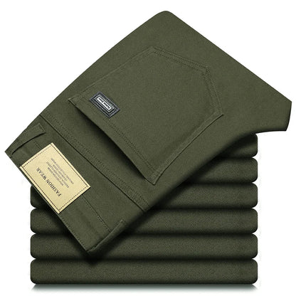Man modeling classic fit men's trousers, showcasing a smart casual look. Comfortable and stylish.