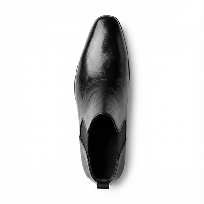 Men's full-grain leather Chelsea boots, elegant slip-on ankle style, perfect for sophisticated casual or dress looks.