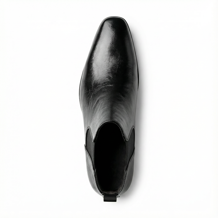 Men's full-grain leather Chelsea boots, elegant slip-on ankle style, perfect for sophisticated casual or dress looks.