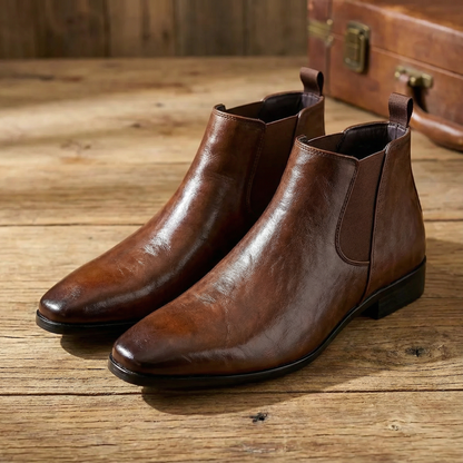 Durable full-grain leather men's Chelsea boots, classic slip-on design for sophisticated style.
