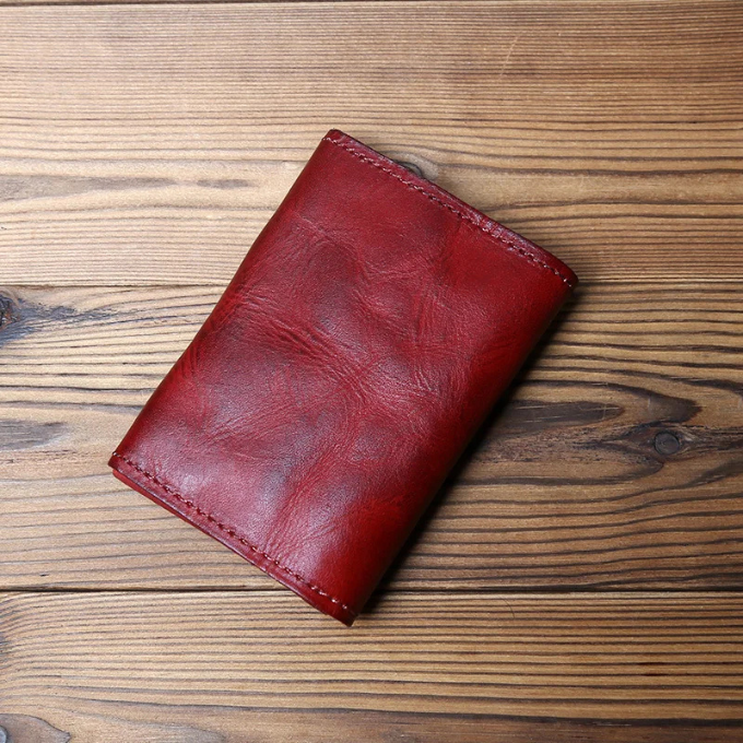 Stylish men's full-grain leather trifold wallet, offering durability, security, and a classic look.