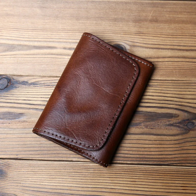 Premium full-grain cowhide leather trifold wallet for men, a classic and durable gift for him.