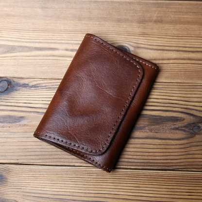 Premium full-grain cowhide leather trifold wallet for men, a classic and durable gift for him.