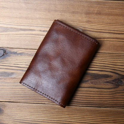 Classic style men's trifold wallet, crafted from durable full-grain cowhide leather. Secure & lasting.