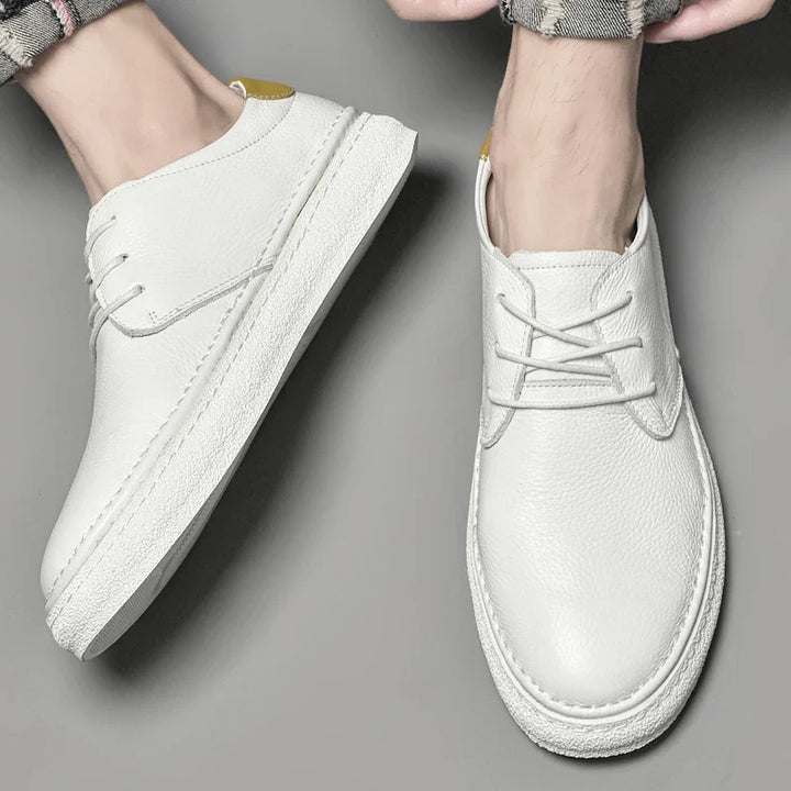 Men's classic genuine leather Oxford dress shoes, lace-up for formal or smart casual wear.
